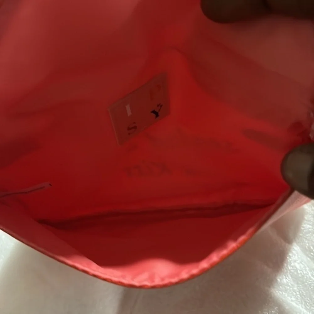 IPSy cosmetic red bag